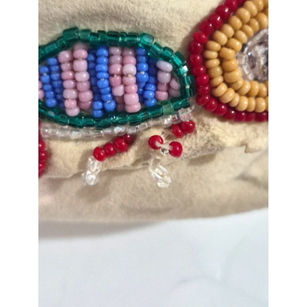 Vintage Crow Beaded Hide Moccasins featuring Intricate Colorful Glass Beadwork